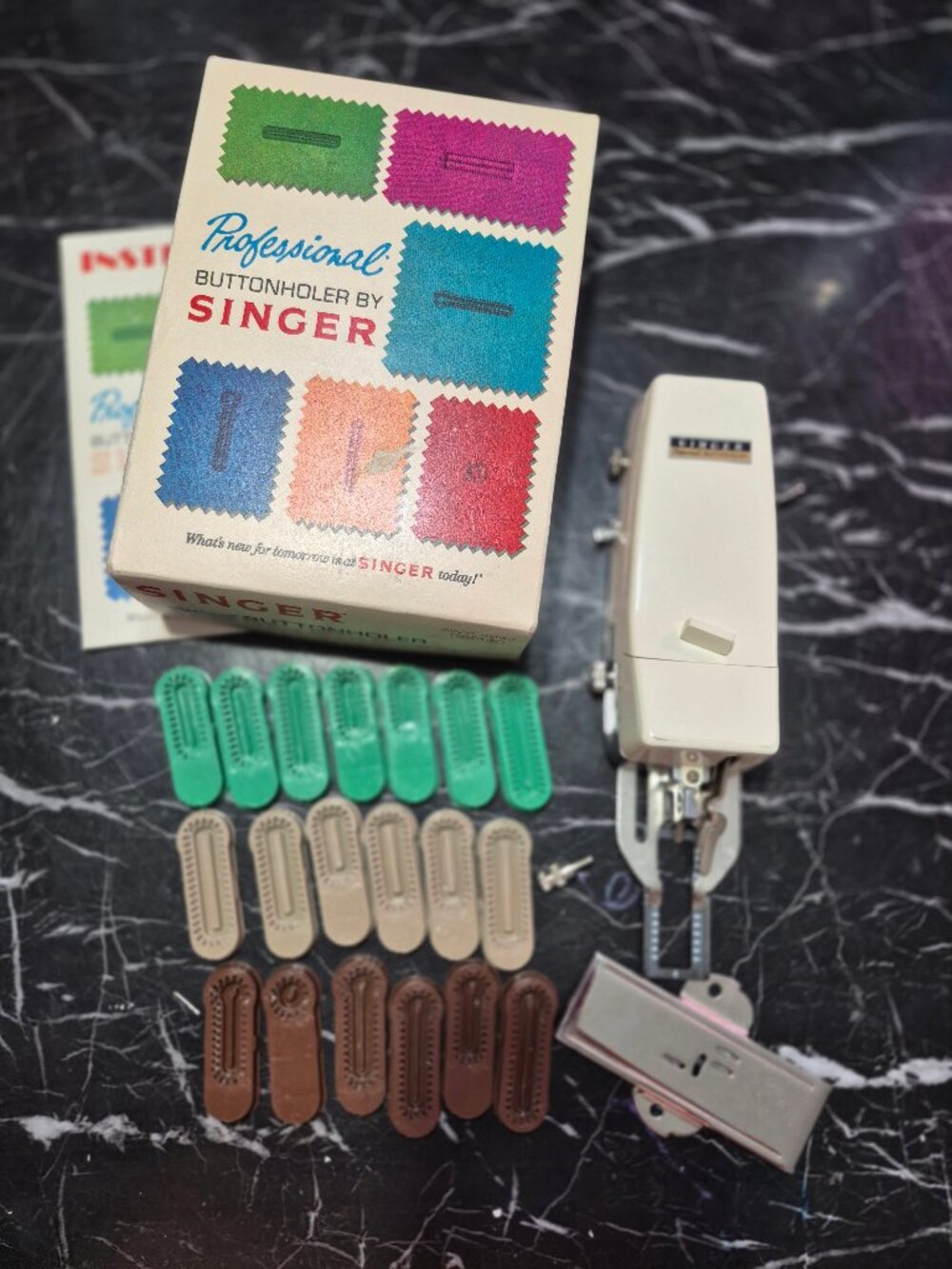 Singer Buttonholer,fits slant needle zig zag sewing machines. In box.
